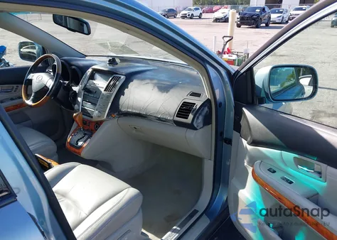 2009 Lexus Rx z USA, uszkodzony, nr VIN 2T2HK31U19C115317